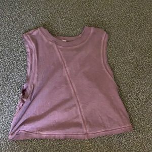 Pink cropped Lululemon exercise shirt